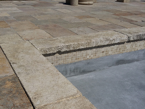 Antique Stone Pool Coping Slabs Milled at 2.5" in Thickness Installed in a pool in a Custom Home in Newport Beach
